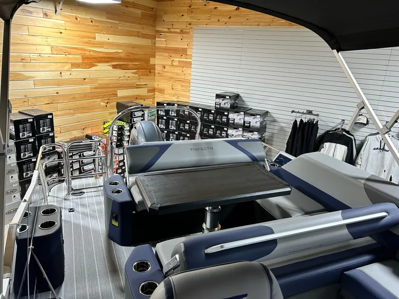 Slide: The Image of 2024 Trifecta 23SBESS pontoon boat interior with modern seating and accessories. - 5