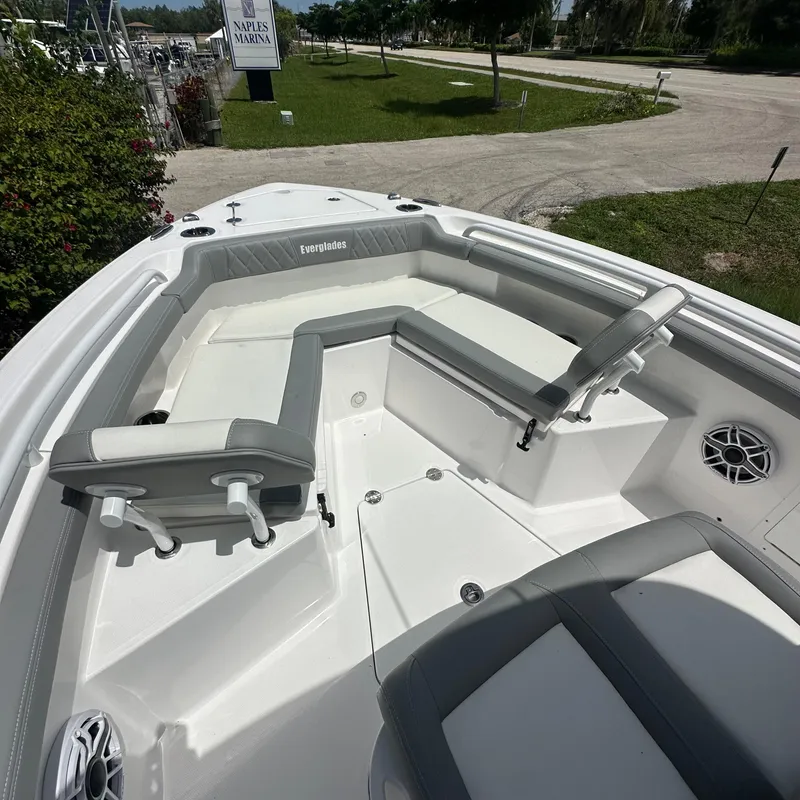 Slide: The Image of 2024 Everglades 235 Center Console boat with spacious seating and modern design. - 2