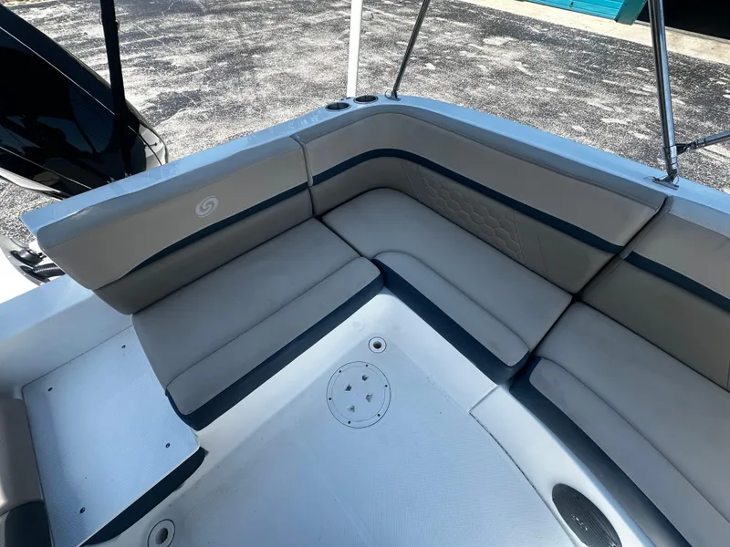 Slide: The Image of 2021 Hurricane SunDeck Sport 192 RL OB boat interior with cushioned seating. - 10