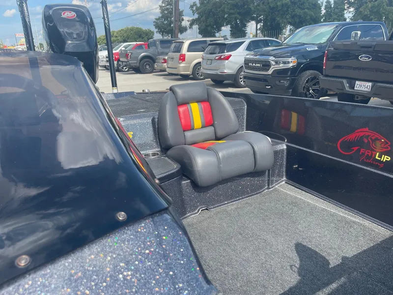 Slide: The Image of 2013 Bullet 21 XRS boat with custom seating and Fat Lip logo. - 19