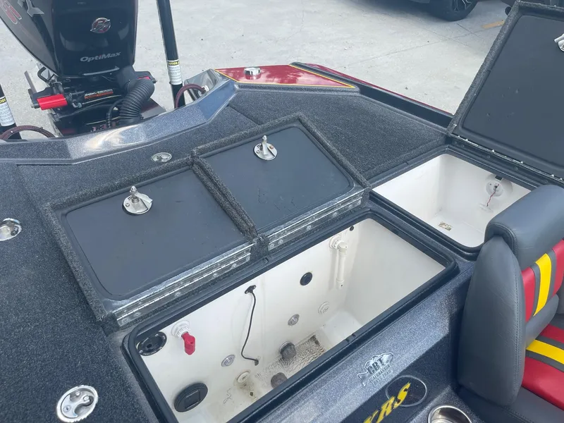 Slide: The Image of 2013 Bullet 21 XRS boat with open storage compartments and OptiMax engine. - 22