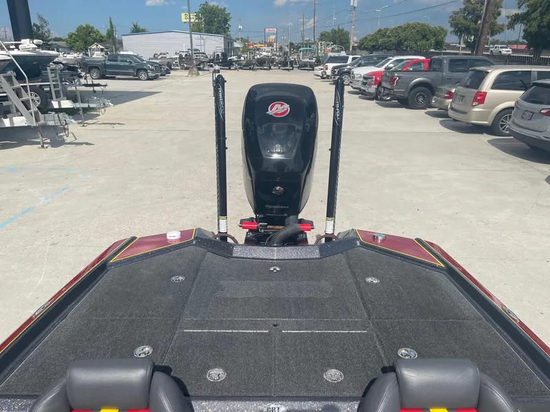 Slide: The Image of 2013 Bullet 21 XRS boat with motor in a parking lot. - 25