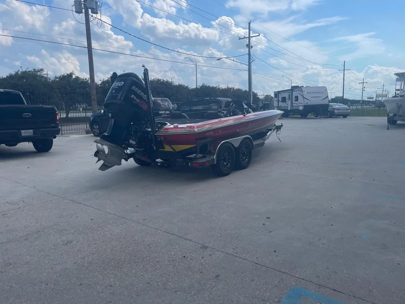 Slide: The Image of 2013 Bullet 21 XRS boat on trailer in parking lot. - 4