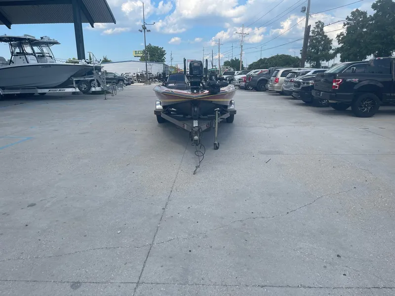 Slide: The Image of 2013 Bullet 21 XRS boat on a trailer in a parking lot. - 7
