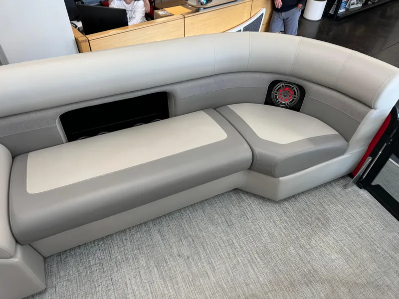 Slide: The Image of 2024 Premier 250 SunSation RL boat seating, luxurious gray and beige upholstery. - 14