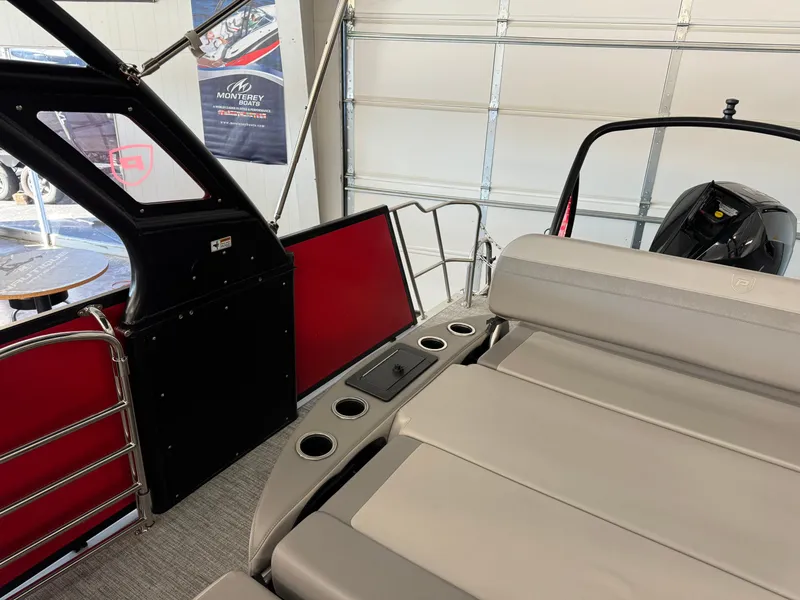 Slide: The Image of 2024 Premier 250 SunSation RL pontoon boat interior with seating and cup holders. - 18