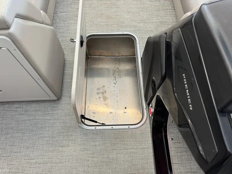 Slide: The Image of 2024 Premier 250 SunSation RL boat interior storage compartment. - 21