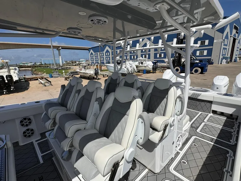 Slide: The Image of 2022 Invincible 46 Catamaran interior with luxurious seating and modern design. - 13