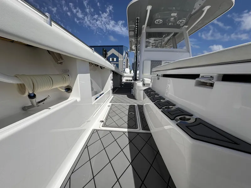Slide: The Image of 2022 Invincible 46 Catamaran deck view with sleek design and modern features. - 9