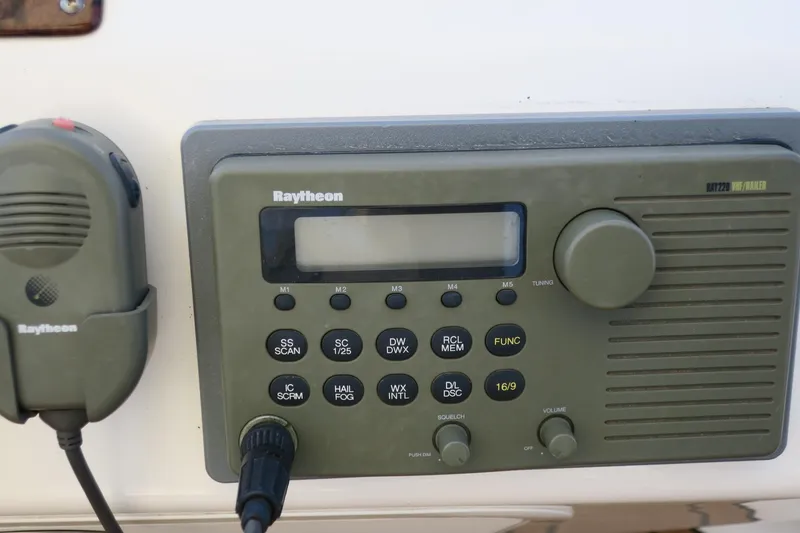 Slide: The Image of Raytheon marine radio on a 2002 Sea Ray 400 Sedan Bridge yacht. - 10