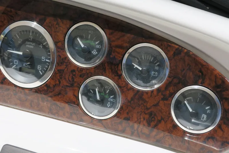 Slide: The Image of Close-up of 2002 Sea Ray 400 Sedan Bridge dashboard gauges. - 11