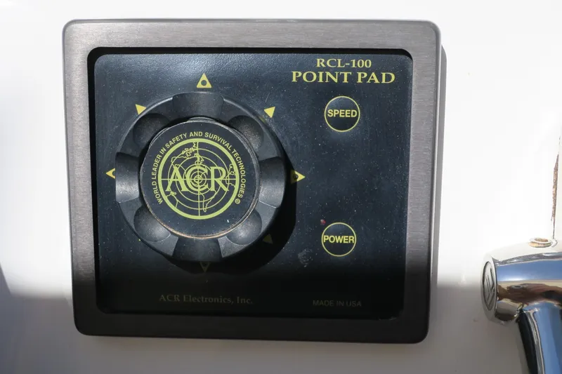 Slide: The Image of ACR RCL-100 Point Pad control panel on 2002 Sea Ray 400 Sedan Bridge. - 13