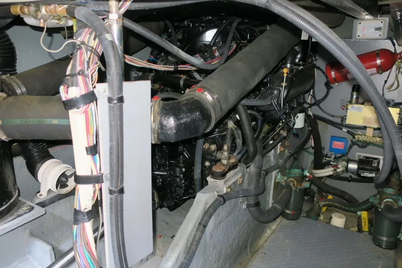 Slide: The Image of Engine compartment of a 2002 Sea Ray 400 Sedan Bridge yacht. - 30