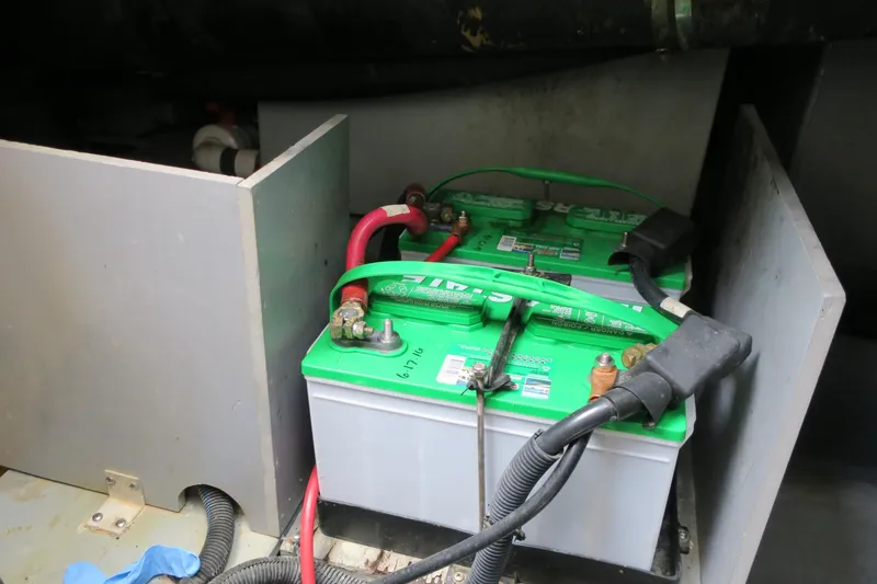 Slide: The Image of Battery compartment of a 2002 Sea Ray 400 Sedan Bridge boat. - 32