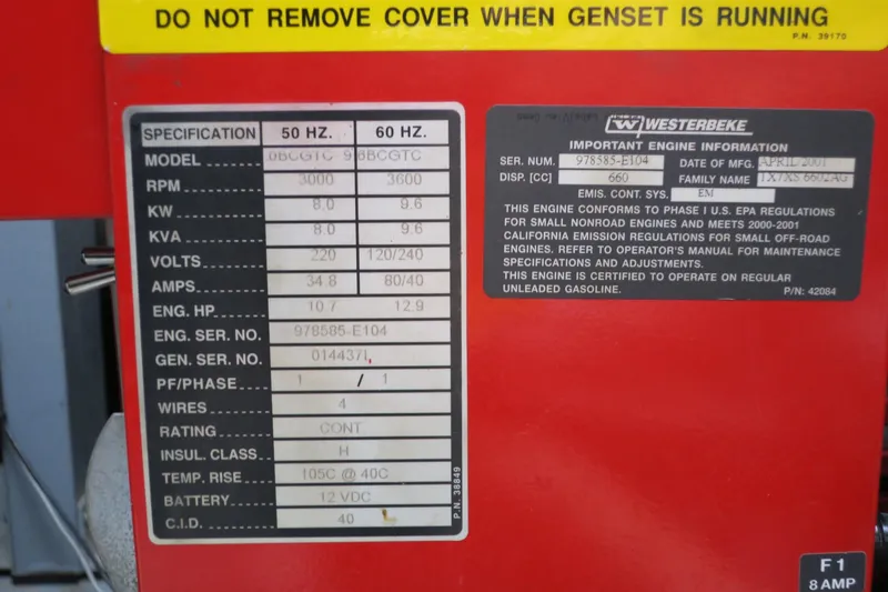 Slide: The Image of 2002 Sea Ray 400 Sedan Bridge Westerbeke generator specifications and engine information label. - 37