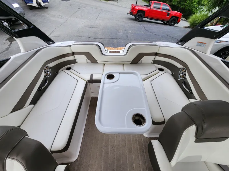 Slide: The Image of Interior of 2016 Yamaha Boats 242 Limited S with seating and table. - 11