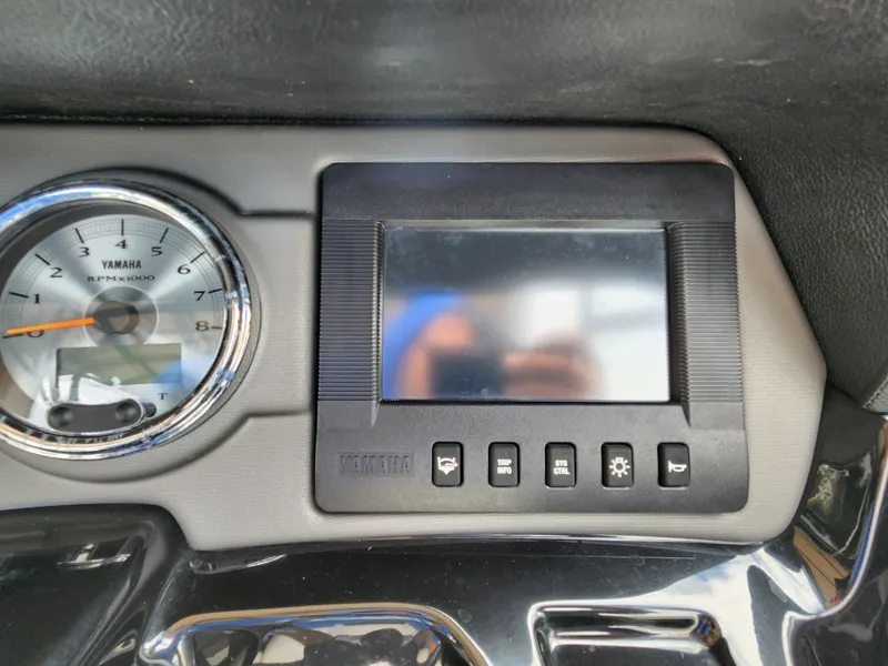 Slide: The Image of Yamaha 242 Limited S 2016 dashboard with gauge and control panel. - 16