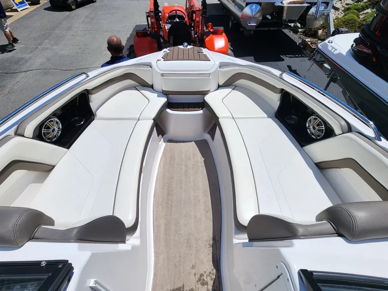 Slide: The Image of 2016 Yamaha Boats 242 Limited S interior with spacious seating and modern design. - 22