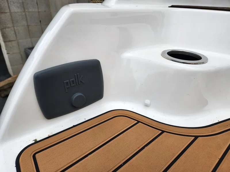 Slide: The Image of Yamaha 242 Limited S 2016 boat with Polk audio speaker and teak-style flooring. - 9