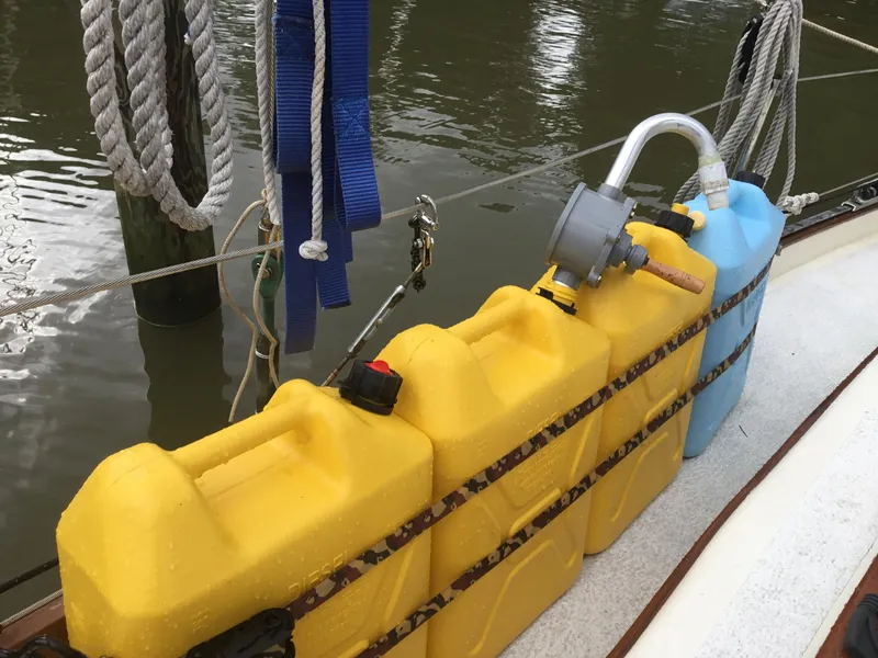 Slide: The Image of Jerry cans with fuel transfer pump - 43