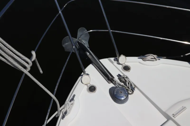 Slide: The Image of Bow of 2007 Carver 35 Super Sport yacht with anchor and ropes. - 12