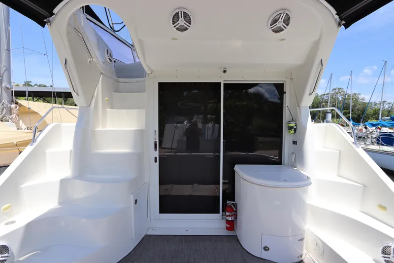 Slide: The Image of 2007 Carver 35 Super Sport yacht interior with stairs and sliding door. - 7