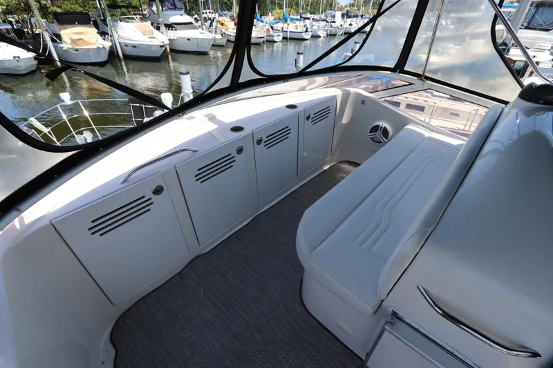 Slide: The Image of 2007 Carver 35 Super Sport yacht interior with seating and storage compartments. - 16
