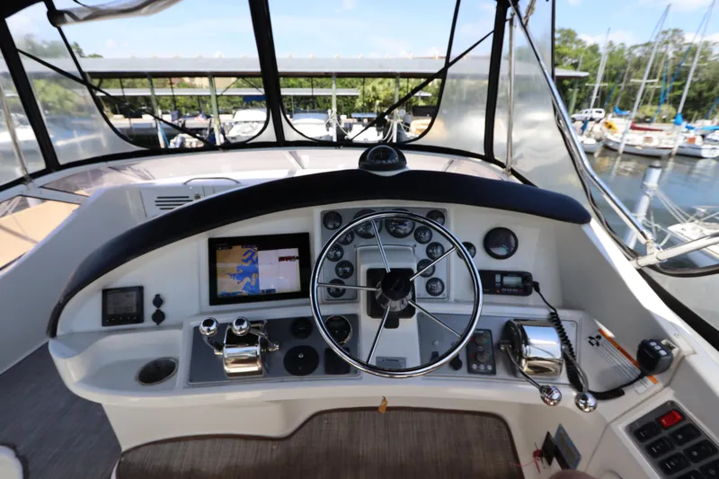 Slide: The Image of Helm of 2007 Carver 35 Super Sport yacht with navigation equipment. - 19