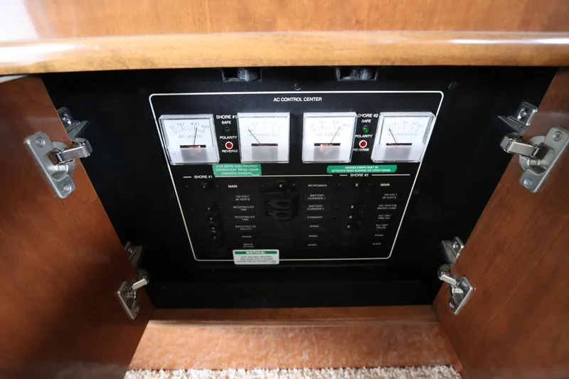 Slide: The Image of Electrical control panel inside a 2007 Carver 35 Super Sport boat. - 40