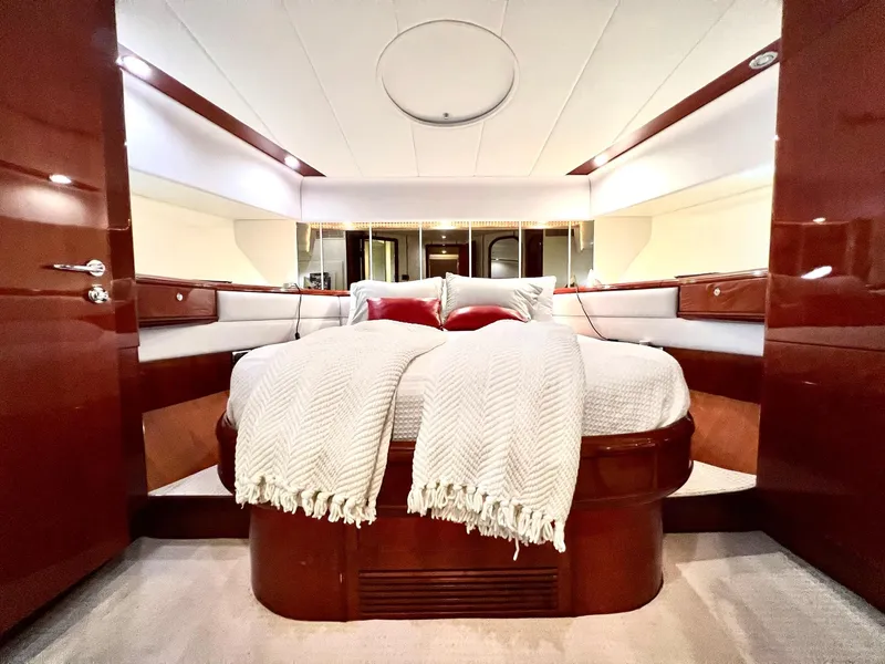 Slide: The Image of Luxurious master bedroom in a 1999 Fairline Squadron 65 yacht. - 21