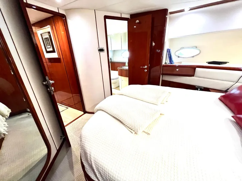 Slide: The Image of Luxurious bedroom interior of 1999 Fairline Squadron 65 yacht with ensuite bathroom. - 22