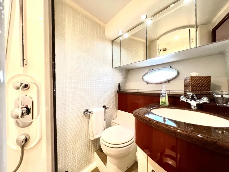 Slide: The Image of Luxurious bathroom in a 1999 Fairline Squadron 65 yacht with modern fixtures. - 23