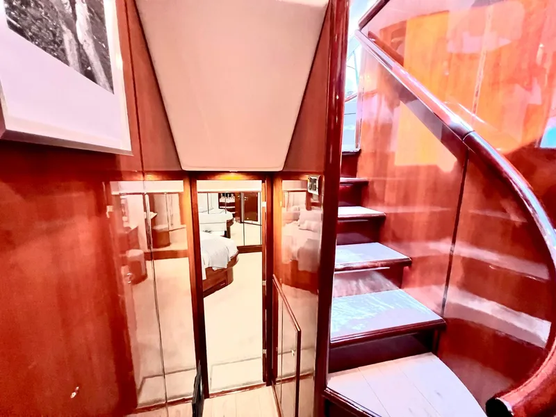 Slide: The Image of Interior of 1999 Fairline Squadron 65 yacht with wooden stairs and bedroom view. - 28