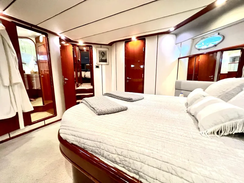 Slide: The Image of Luxurious master bedroom on a 1999 Fairline Squadron 65 yacht. - 30