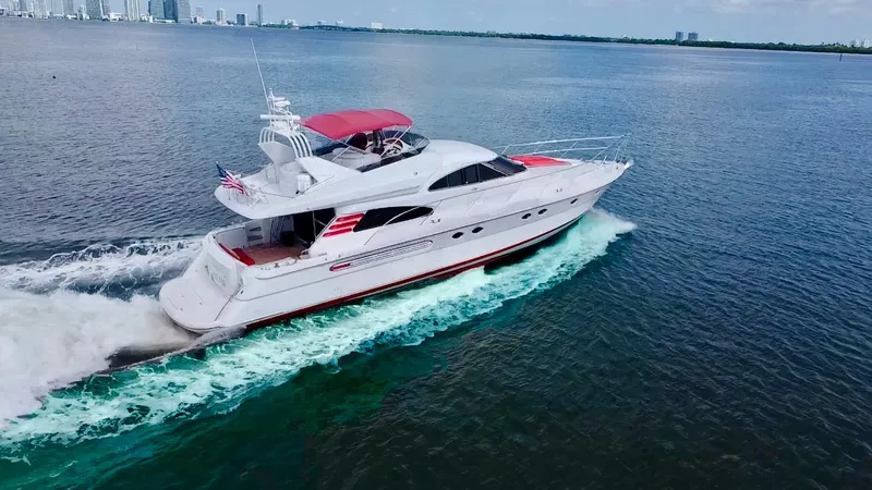 Slide: The Image of 1999 Fairline Squadron 65 yacht cruising on open water. - 5