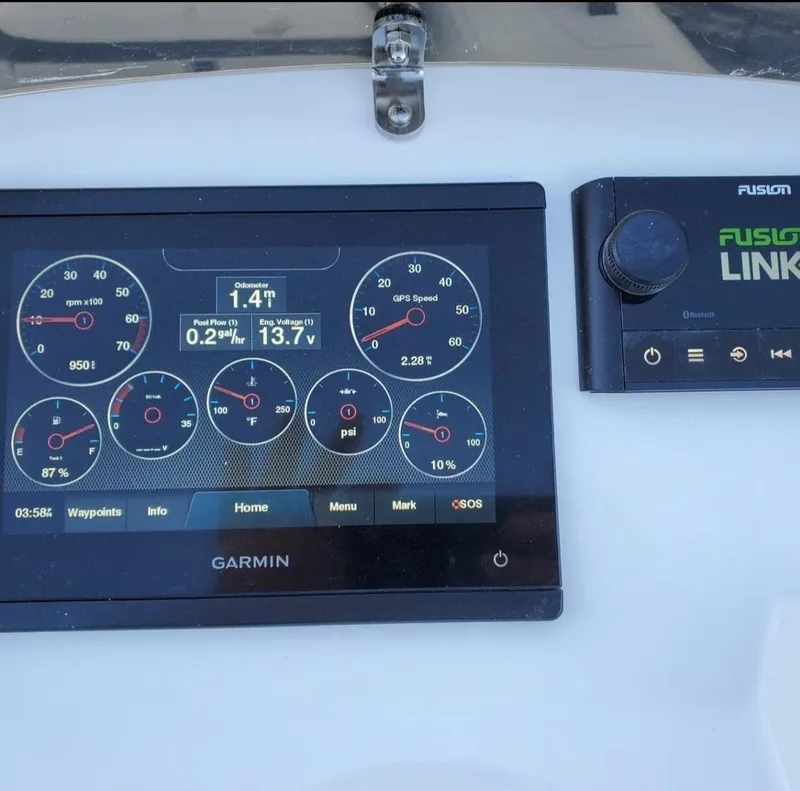 Slide: The Image of Garmin display and Fusion Link system on Walker Bay Generation 13 LTE 2025 boat. - 5