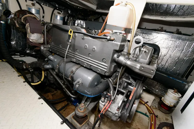 Slide: The Image of 2004 Cruisers Yachts 370 Express engine compartment with detailed view of the engine. - 18