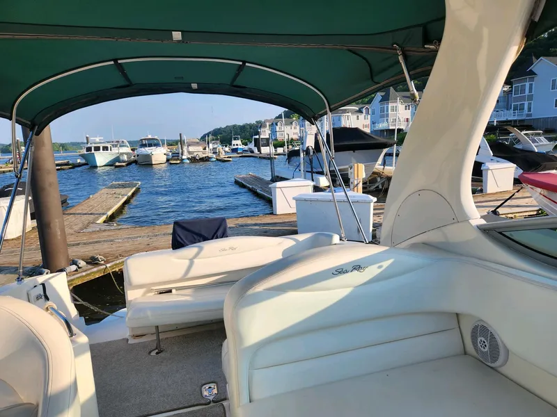 Slide: The Image of 2004 Sea Ray 280 Sundancer at marina dock with waterfront view. - 7