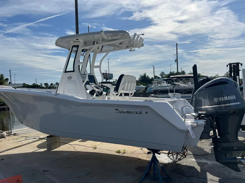 Slide: The Image of 2024 Tidewater 232 CC Adventure boat with Yamaha outboard motor. - 2