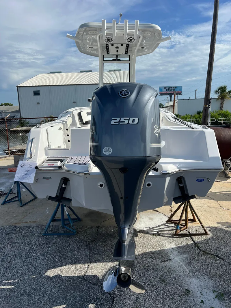 Slide: The Image of 2024 Tidewater 232 CC Adventure boat with a 250 HP outboard motor. - 3
