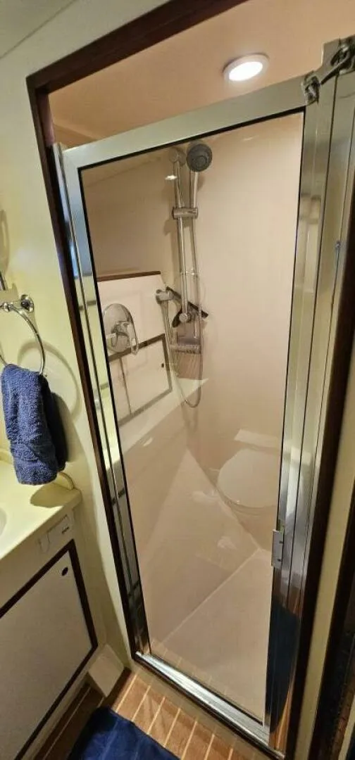 Slide: The Image of Interior of 1969 Derecktor 68 Hunt Motor Yacht with bunk beds and storage. - 15