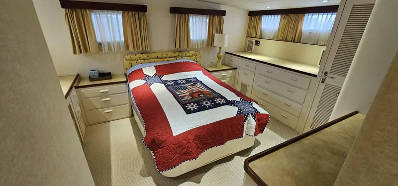 Slide: The Image of Luxurious bedroom interior of 1969 Derecktor 68 Hunt Motor Yacht with elegant decor. - 19