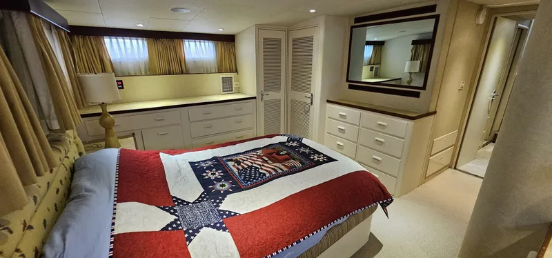 Slide: The Image of Luxurious bedroom interior of 1969 Derecktor 68 Hunt Motor Yacht with elegant furnishings. - 20