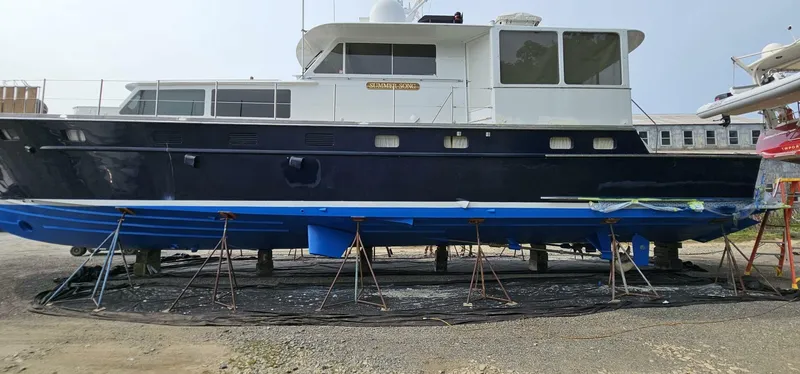 Slide: The Image of 1969 Derecktor 68 Hunt Motor Yacht on dry dock for maintenance. - 26