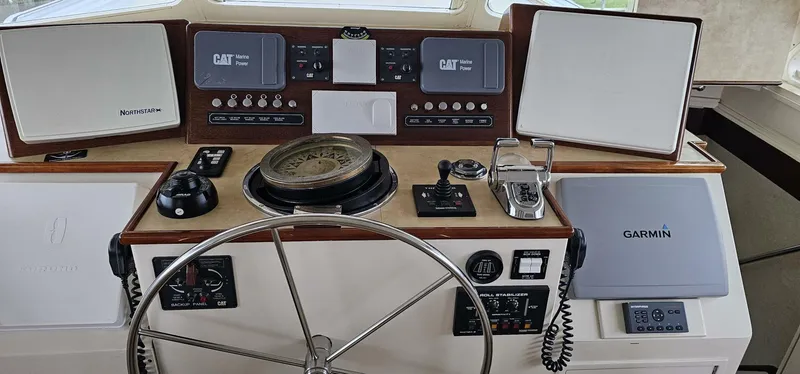 Slide: The Image of Interior helm of 1969 Derecktor 68 Hunt Motor Yacht with navigation equipment. - 8