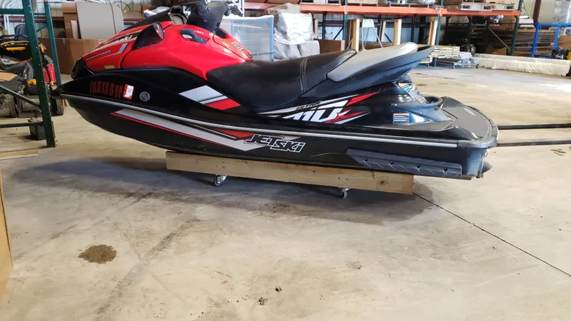 Slide: The Image of 2019 Kawasaki Jetski Ultra 310X in a garage setting. - 3