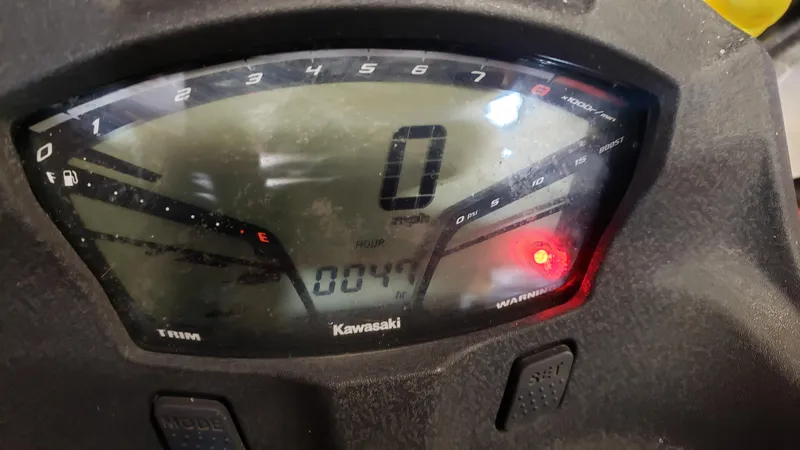 Slide: The Image of Dashboard of a 2019 Kawasaki Jetski Ultra 310X displaying speed and indicators. - 5