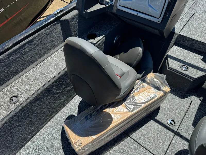 Slide: The Image of 2024 Tracker Pro Guide V-175 Combo boat interior with seating and packaged equipment. - 13