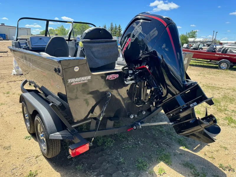 Slide: The Image of 2024 Tracker Pro Guide V-175 Combo boat with powerful outboard motor. - 4