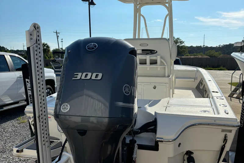 Slide: The Image of 2021 Pathfinder 2500 Hybrid boat with a Yamaha 300 outboard motor. - 11